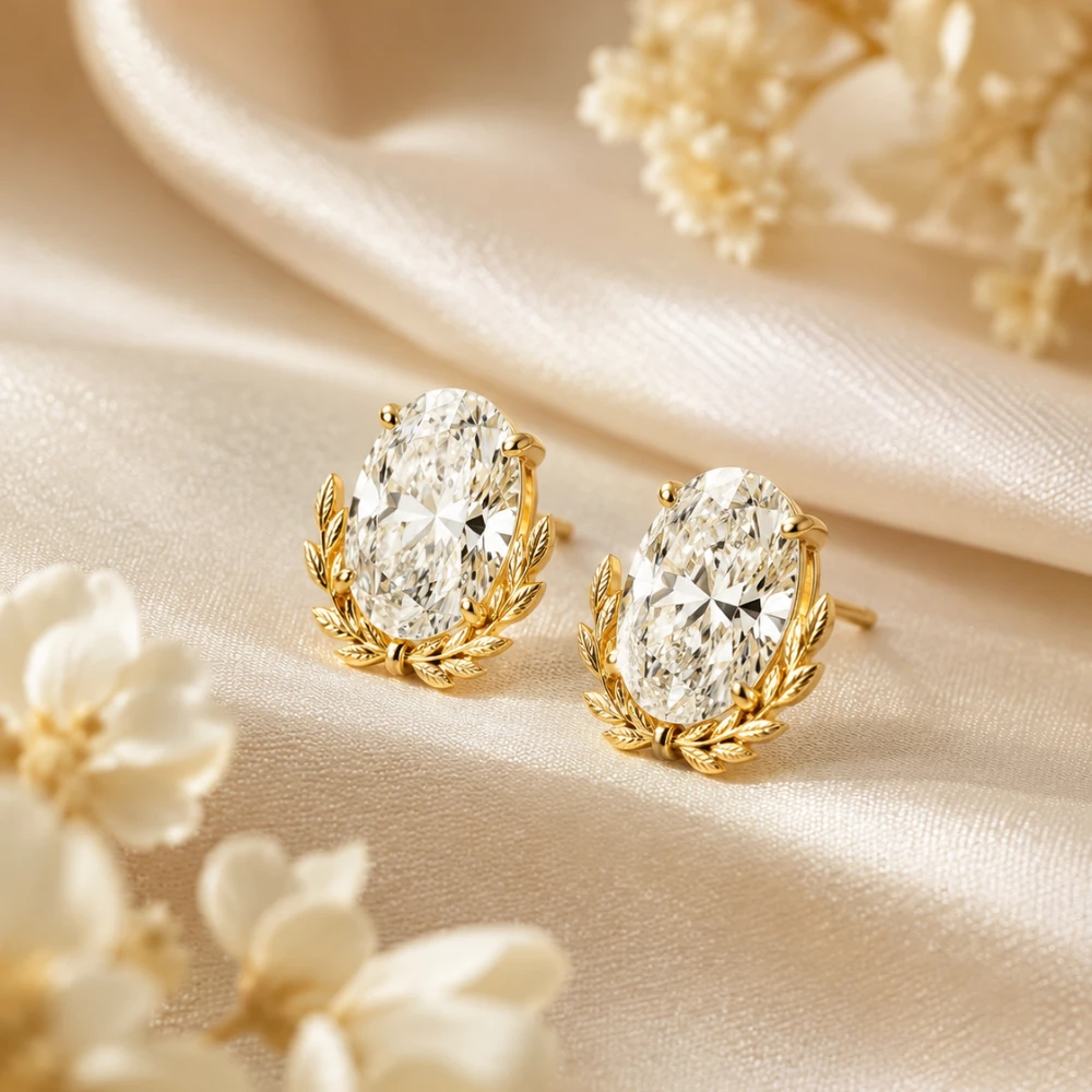 The Laurel Oval Studs — Oval · Frame Laurel · Emas 18K