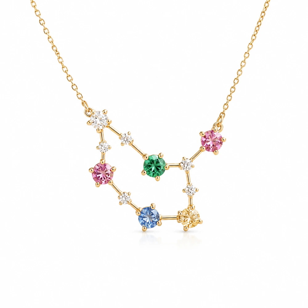 The Constellation Necklace — Rasi bintang personal · 4 batu warna 0,15 ct · 8 berlian 0,02 ct · Rantai 42 cm · Emas 18K