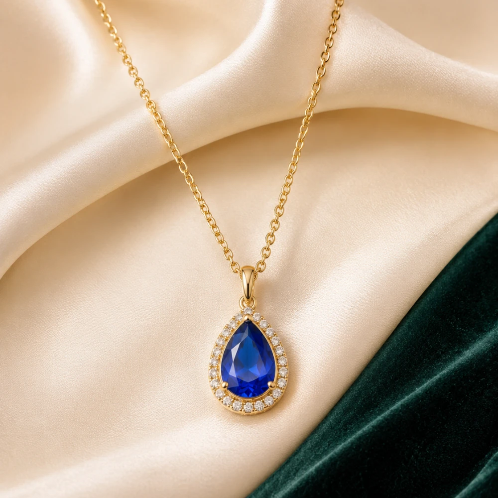 The Sapphire Royal Drop — Blue Sapphire Pear · Halo Berlian