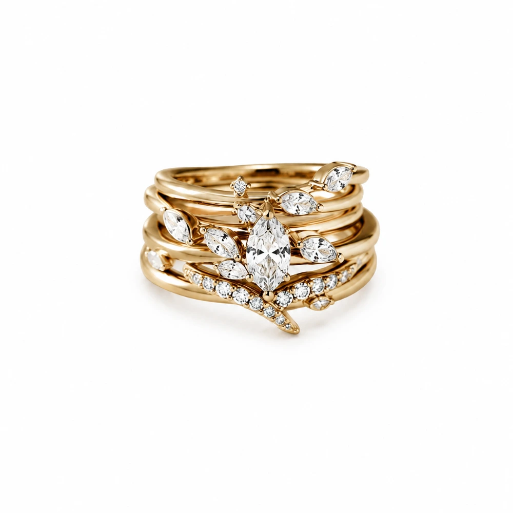 The Marquise Bloom Stack — Set 4 cincin · Marquise 0,50 ct + 4 marquise 0,08 ct · Pavé 18 × 0,015 ct · Emas 18K